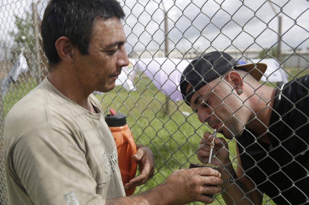 Prisoners share a traditional Uruguayan mate. (Photo: Frederick Bernas)
