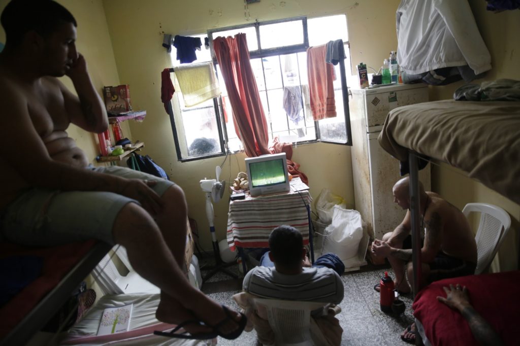 Inmates relax in a cell. (Photo: Frederick Bernas)